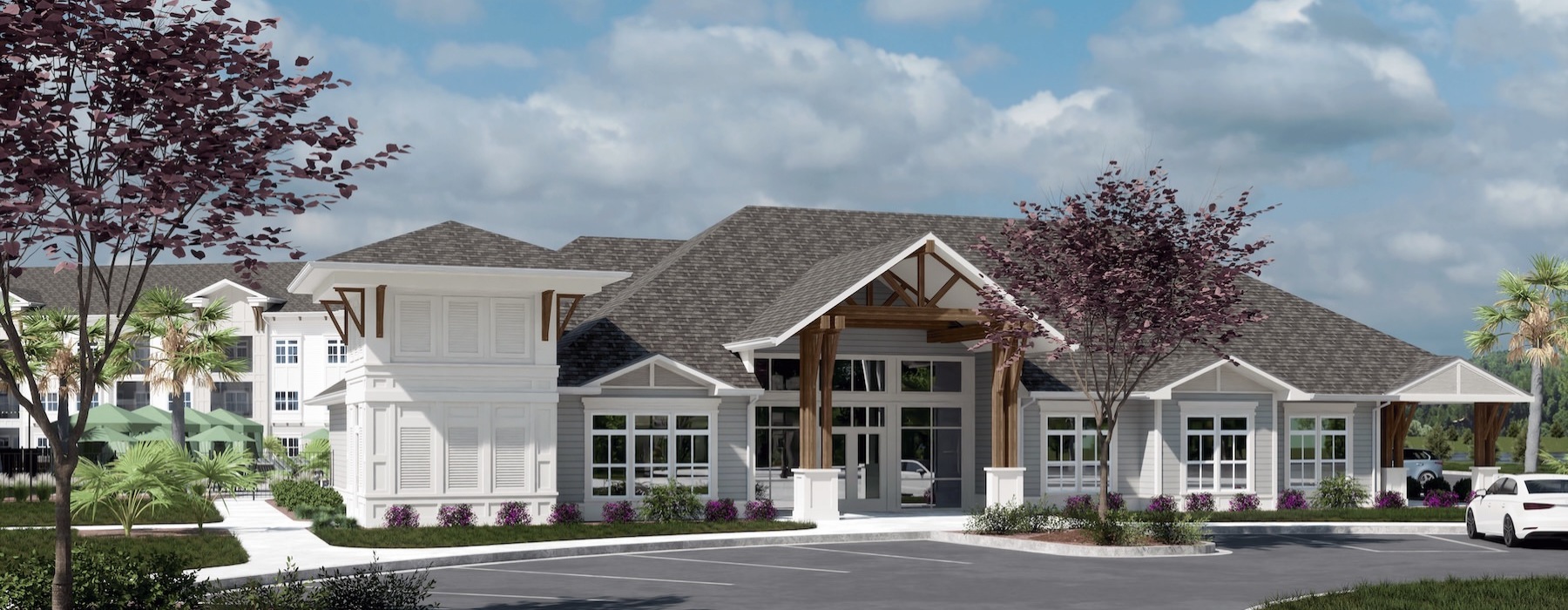 a clubhouse with a parking lot in front of it